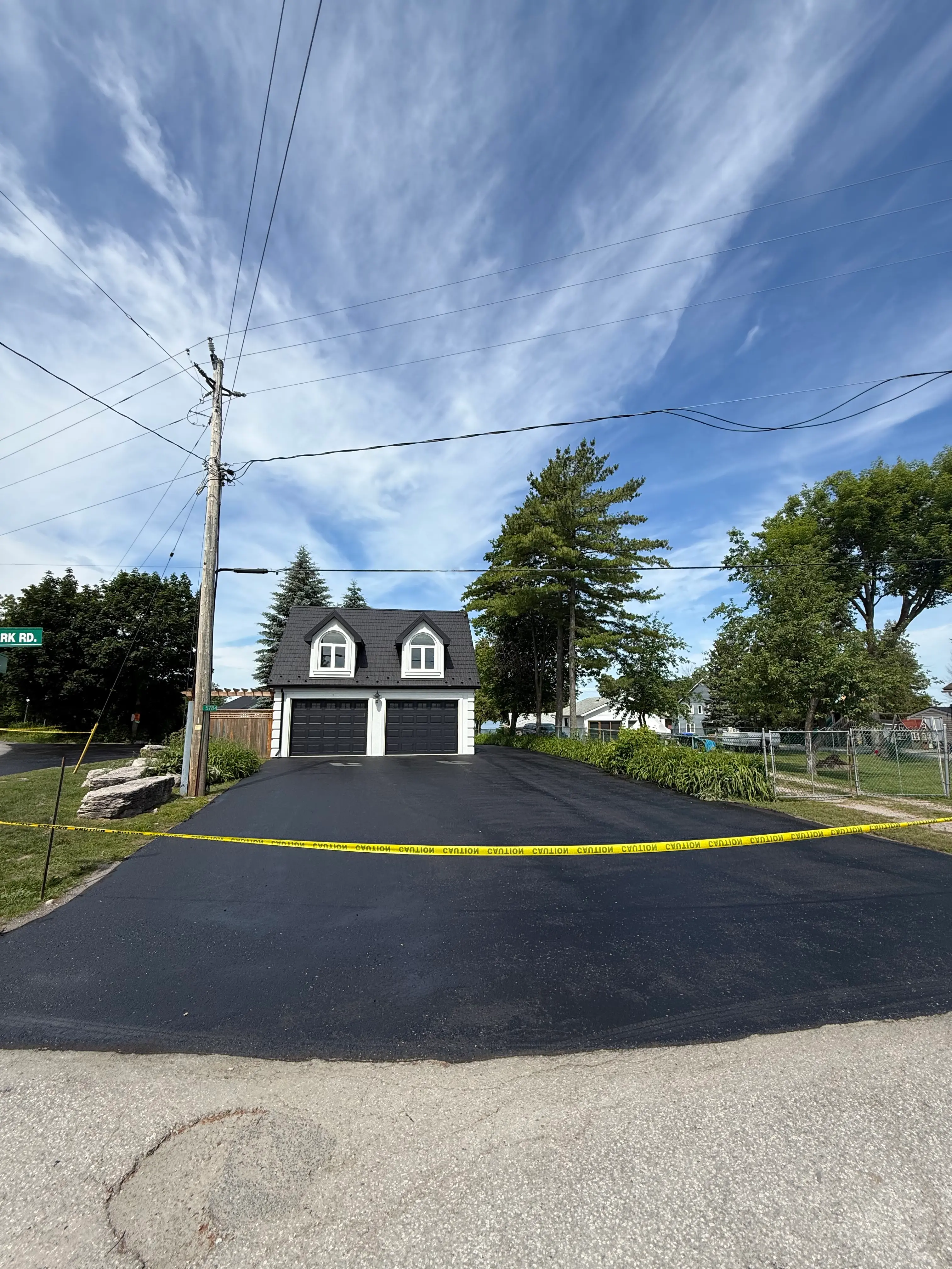 After driveway sealing at a residential driveway in Orillia, ON.
